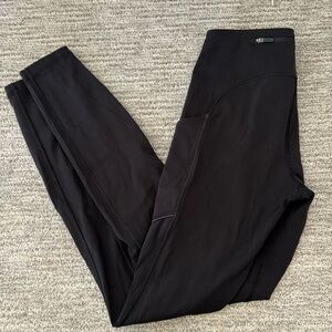 Lululemon ladies black leggings side pockets and back zip pocket size 4